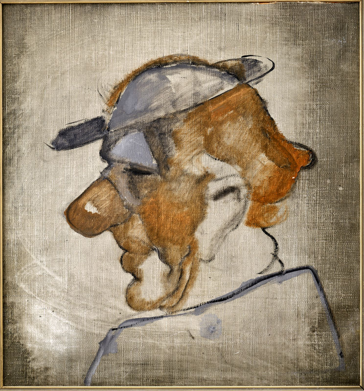 Hlava muža v klobúku
